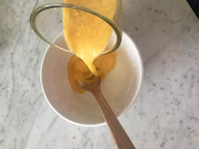 Next you’re going to chop up your fresh peaches into small cubes and blend them together in either a food processor or a blender until you’re left with a creamy texture. Then pour your mixture into your bowl of yogurt and stir together.