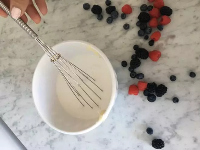 Whisk together the coconut milk and sweetener (we used raw honey) until you have a consistent texture.