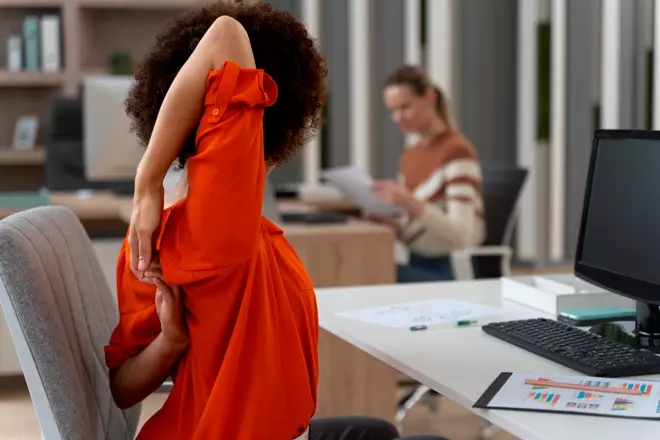Desk-Bound? 5 Simple Stretches to Improve Posture and Reduce Pain Photo Credit: by freepik.com